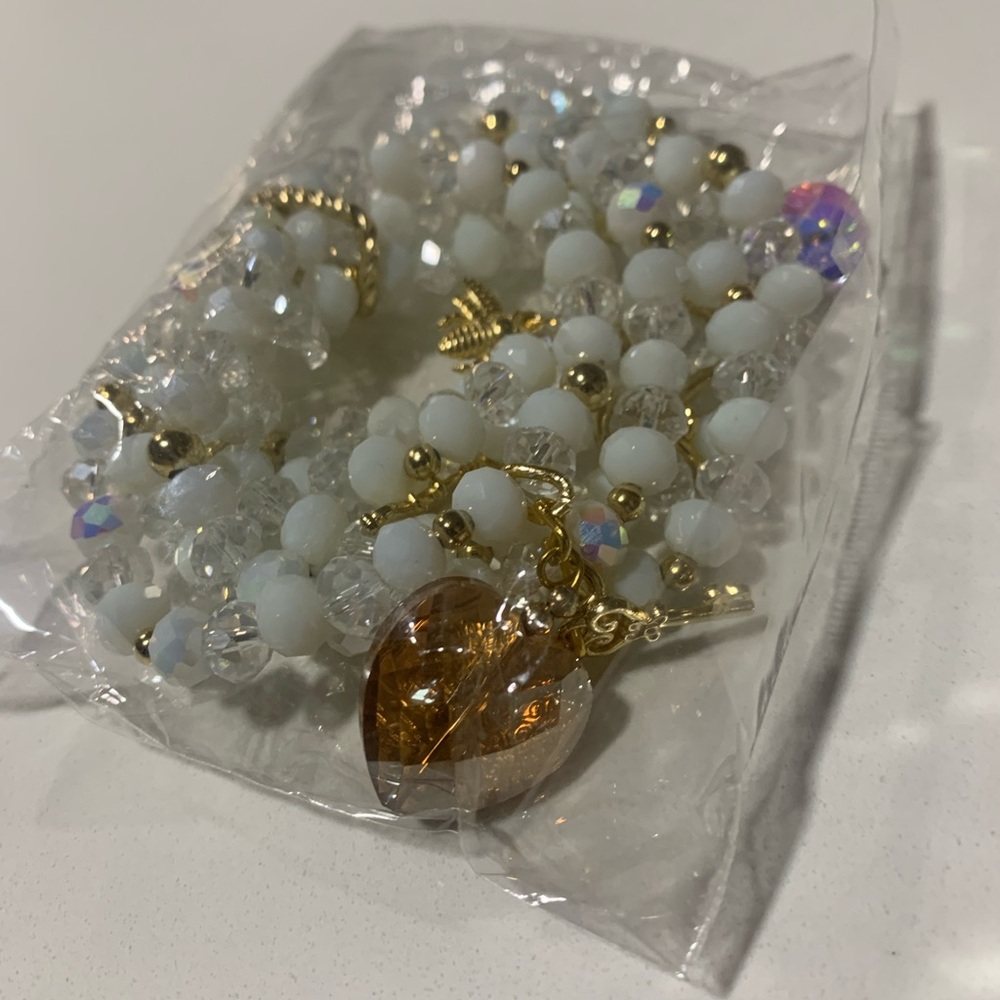 Elegant Gold and White Heart Charm Bracelet